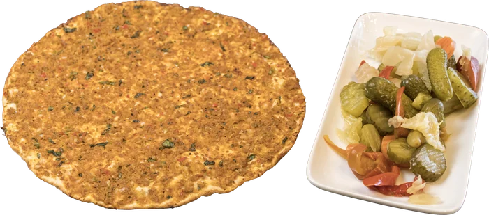 Lahmacun served with mixed pickles